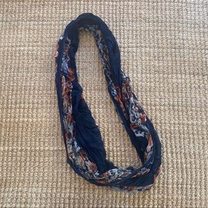 Navy and orange flower patterned infinity scarf